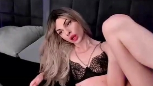 Tiny Titted Tranny Wanks Off in Lingerie