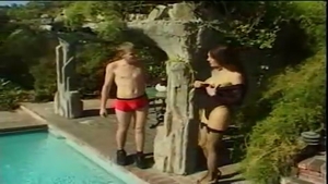 ladyman And man dril Each Other By A Pool